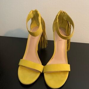 ALDO - yellow tassel heels with zipper entry/exit. Size 6